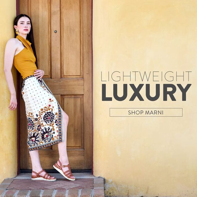 Lightweight Luxury. Shop Marni. Featured style: Marni slingback wedge sandal in brown. 