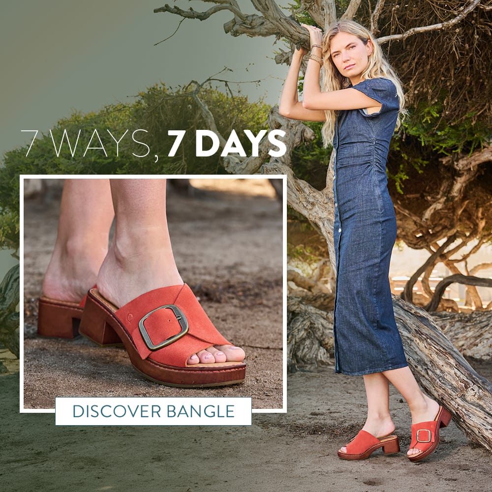7 ways, 7 days. A woman standing under a tree wearing the Bangle heeled slide sandal in orange suede. Discover Bangle.