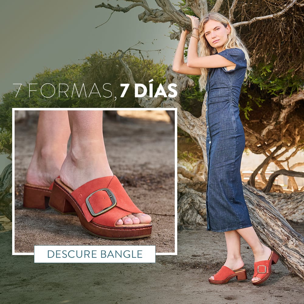 7 formas, 7 d&iacute;as. Una mujer parada bajo un &aacute;rbol usando la sandalia tipo slide con tac&oacute;n Bangle en gamuza naranja. Descubre Bangle.