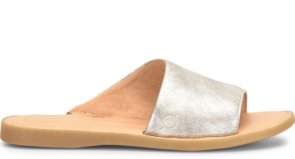 Izabel flat slide sandal in metallic.